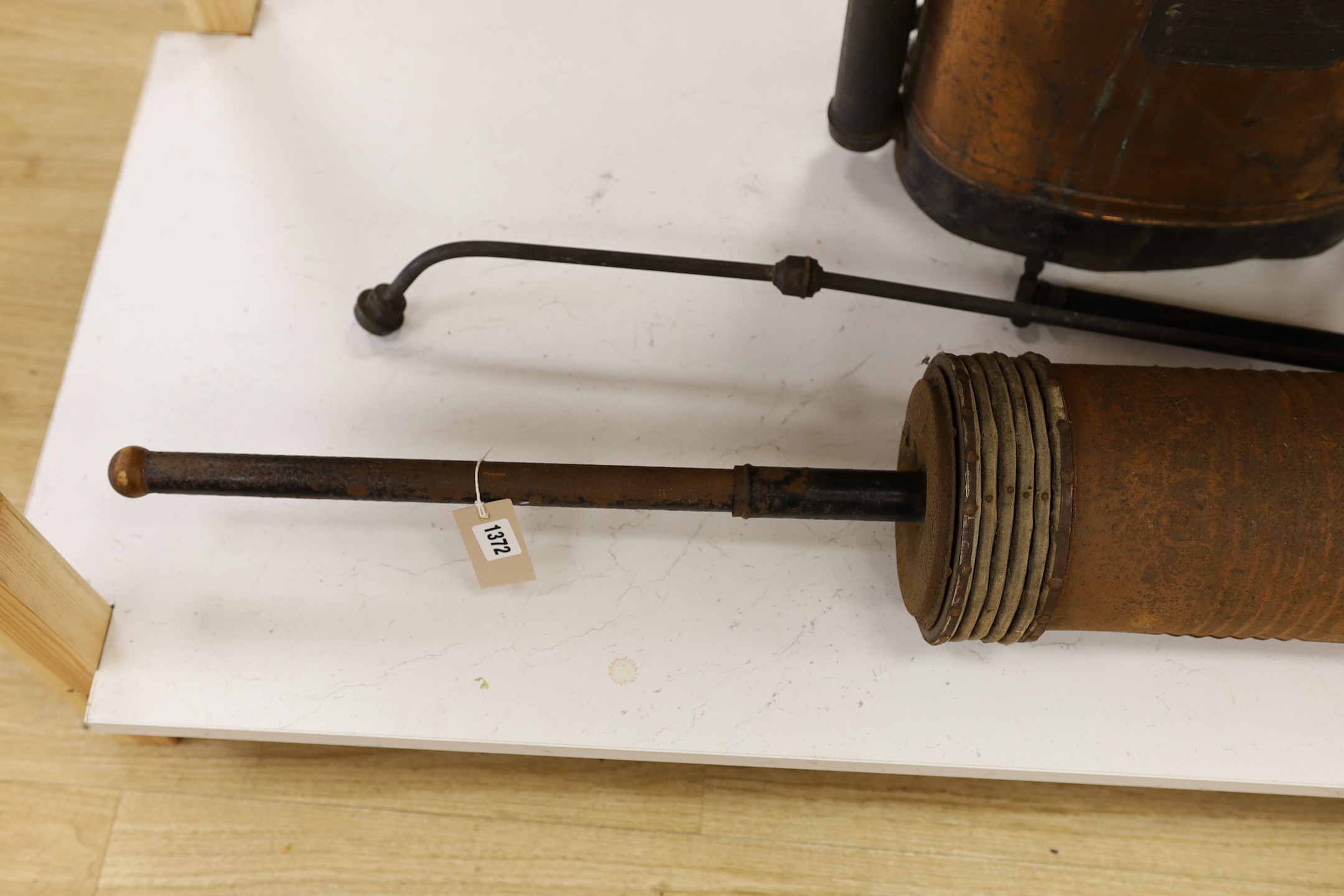 Vintage copper apple sprayer and a Star Vacuum Cleaner